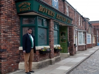 Annesley Abercorn outside the 'Rovers Return' pub on Coronation Street - ITV Granada Studios, Manchester.